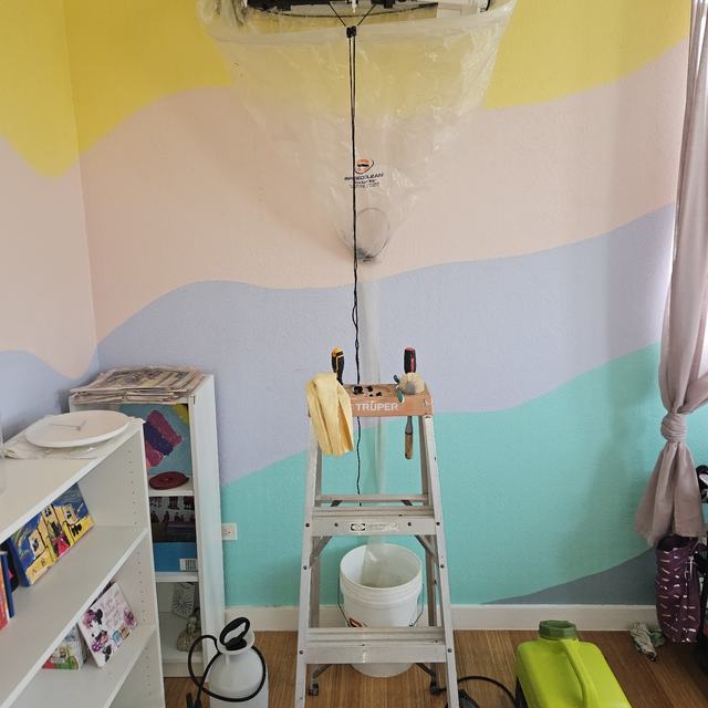 AC unit being serviced